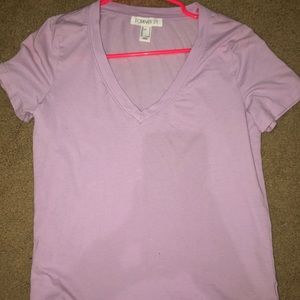 Purple v-neck shirt.